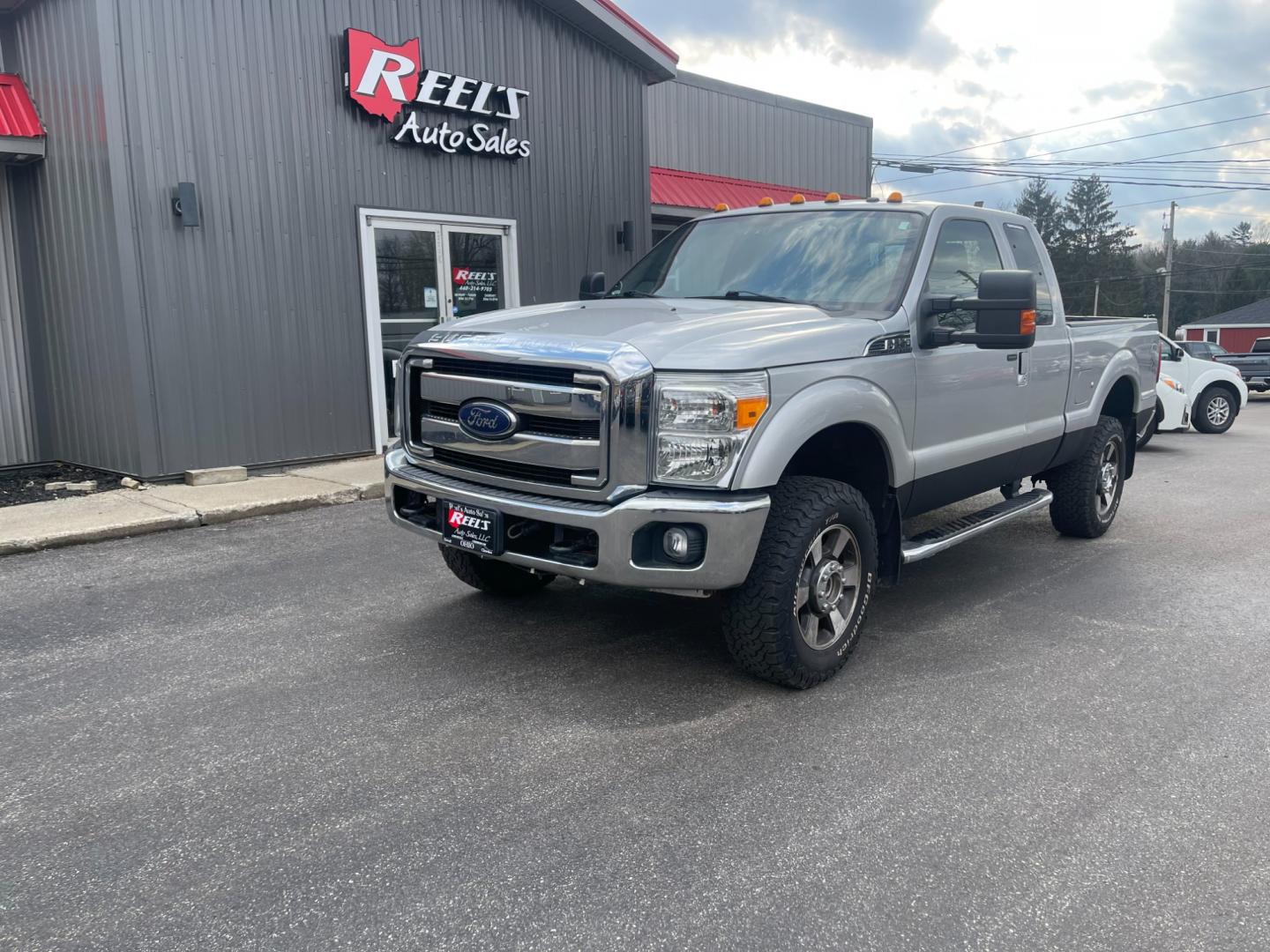 2015 Silver /Black Ford F-250 SD Lariat SuperCab 6.5ft. Bed 4WD (1FT7X2B61FE) with an 6.2L V8 OHV 16V engine, 6-Speed Automatic transmission, located at 547 E. Main St., Orwell, OH, 44076, (440) 437-5893, 41.535435, -80.847855 - Photo#0